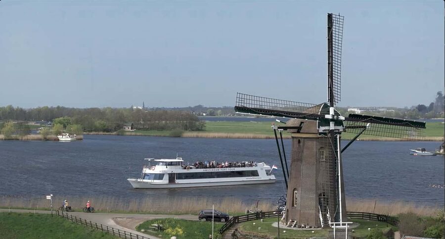 Amsterdam: Tulip Farm Visit, Keukenhof, and Windmill Cruise - The bus ride through South Holland