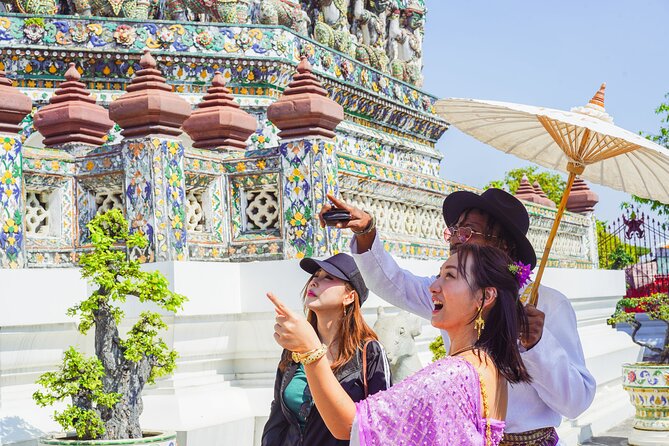 Bangkok Wat Pho and Flower Market Historical Walking Tour - A short boat ride across Bangkok’s river life