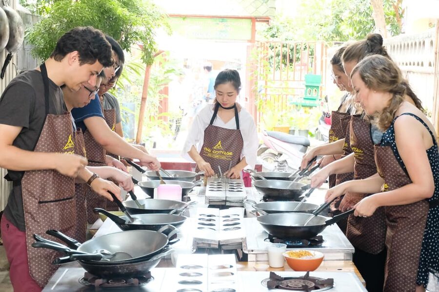 Chiang Mai: Cooking Class, Market & Thai Herbs Garden Tour - Cooking in the organic kitchen garden