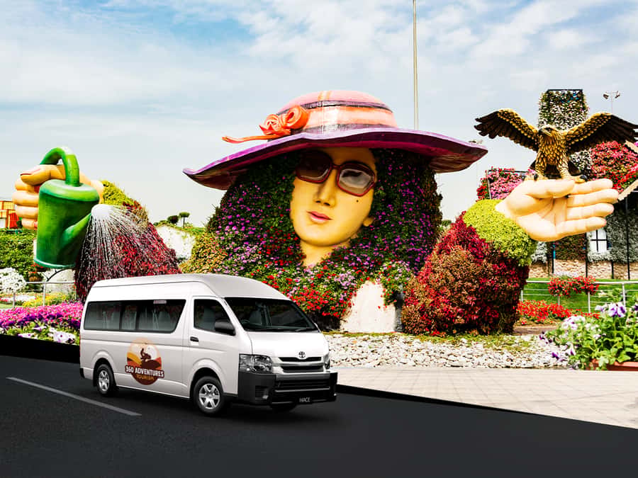 Dubai: Miracle Garden Entry Ticket with Hotel Transfer - Smurfs Village, the floral clock, and the umbrella tunnel