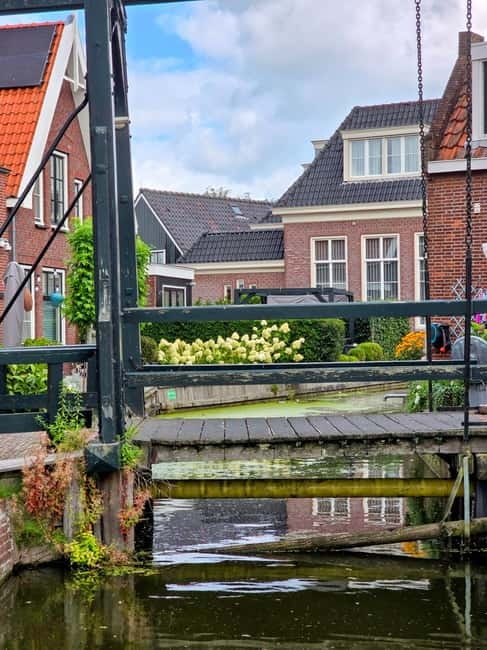 From Amsterdam: Keukenhof Tulips, Windmills & Volendam - Cheese and wooden shoes at a local farm