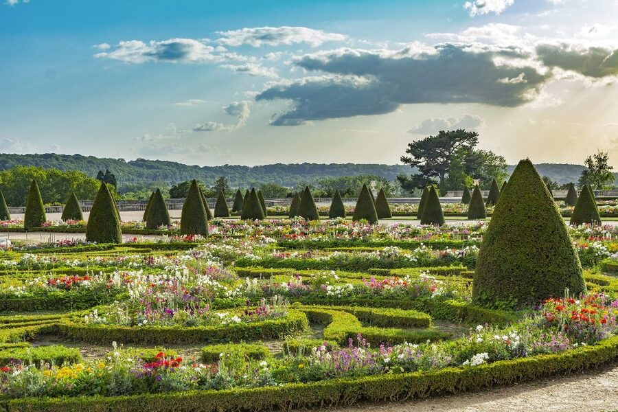 From Paris: Versailles Palace and Gardens Guided Experience - Meeting at Invalides and taking the train