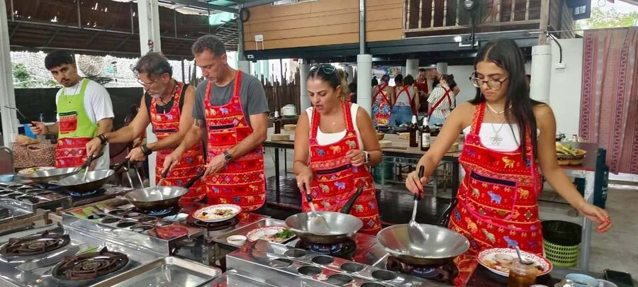 Krabi: Authentic Thai Cooking Class+Thai Herbs Garden Tour - Grinding curry paste gives the class its point