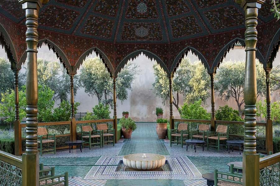 Marrakech: Ben Youssef, Secret Garden, & Souks Walking Tour - Jemaa el-Fnaa: an energetic start in Marrakech’s main square