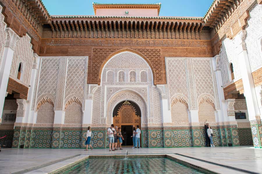 Marrakech: Madrasa Ben Youssef, Secret Garden & Medina Tour - Guide style and the value of local explanation