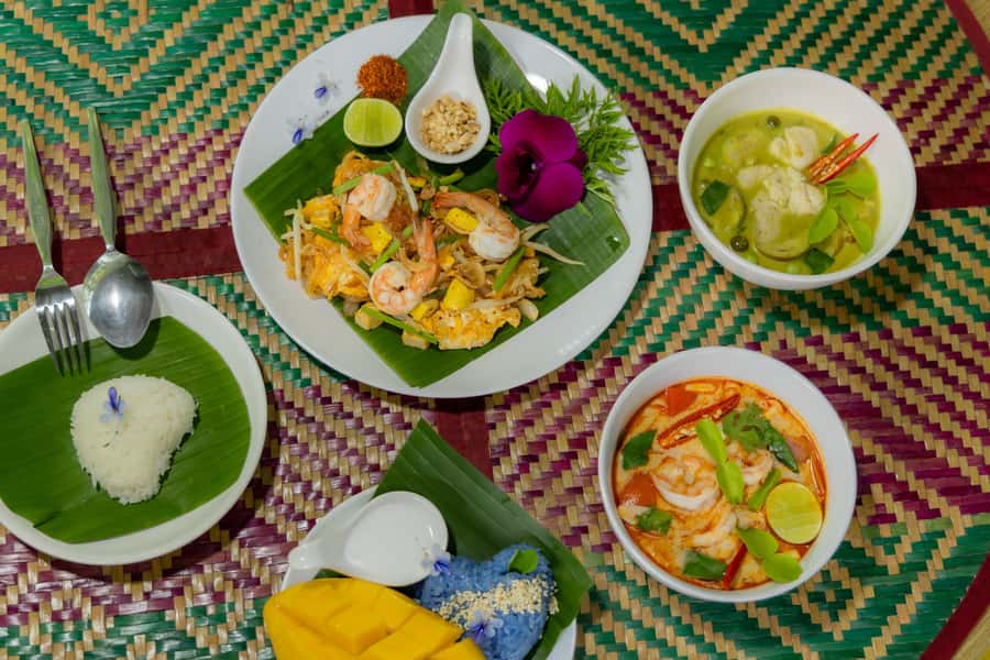 Thai Cooking Class with Market & Garden Tour - Cooking at your own station with Chef Wooddy